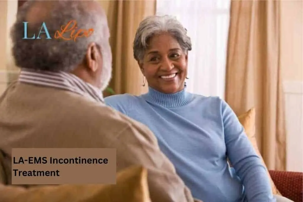 Couple sat smiling at each other - LA-EMS treatment Leytonstone