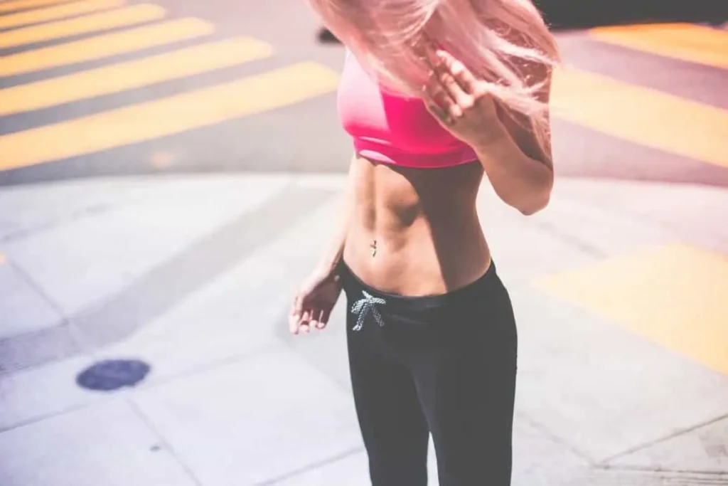 Woman with toned stomach after LA-EMS Body Sculpting Treatment Leytonstone